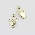 Macro shot of two golden alloy ILY gesture charms with smooth polished finish for DIY jewelry - Gold