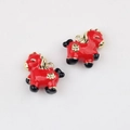 Macro detail of red enamel horse charms with golden floral patterns for DIY jewelry - Gold With Red