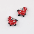 Detail of red enamel pony charms with silver floral patterns and metal alloy base - Silver With Red