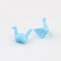 Macro shot of two light blue paper crane charms for DIY jewelry making accessories - Sky Blue