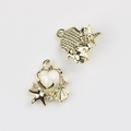 Macro detail of heart-shaped ocean pendants with starfish, shells and gold plating - Gold with White