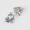 Detailed front and back view of silver heart pendant with sea shell and starfish charms - Silver Base Blue