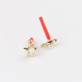 Detailed view of gold star stud earrings with white pearl inlay on stainless steel posts - Gold Pearl
