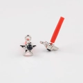 Detailed view of silver star earrings with black zircon stones and protective red tubes - Silver Base Black Rhinestone