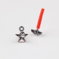 Detailed macro view of star-shaped alloy earrings with cubic zirconia and orange sleeve - Gun Black with White Rhinestone