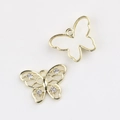 Detailed view of alloy butterfly charms with 18K gold plating and zircon inlay for DIY jewelry - Gold White