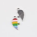 Close-up of rainbow enamel and textured silver alloy heart-shaped puzzle pendant charms - Silver Base Right Heart Style