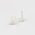 Detail of white matte lacquer heart-shaped jewelry components for DIY earrings and crafts - White