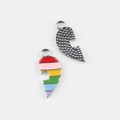 Macro detail of rainbow enamel heart puzzle charms and textured silver alloy back side - Silver Base Left Heart Style