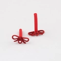 Macro detail of red bow-shaped alloy earring bases with matte finish for DIY jewelry - Red