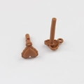 Close-up of brown heart-shaped alloy pendant charms for DIY jewelry making accessories - Brown