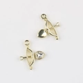 Detailed view of cupid's arrow charms with heart zircon inlays for DIY jewelry making - Gold White Zirconia