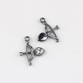 Detailed view of gunmetal alloy Cupid arrow pendants with inlaid heart cubic zirconia - Gunmetal with White Zirconia