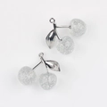 Macro shot of silver cherry pendants with glitter filled resin for DIY jewelry making - Silver Branch & White Cherry