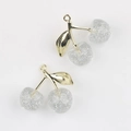 Detail of cherry resin pendants with silver glitter and golden metal leaf for DIY jewelry - Gold Branch & White Cherry