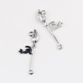 Detail view of double-hole enamel black cat on broom alloy connector pendants - Silver