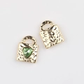 Macro view of gold alloy heart lock pendants with green crystal and leopard texture - Gold Green Rhinestone