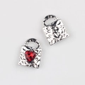 Macro shot of retro punk alloy heart lock pendant with red zircon and textured metal detail - Silver Red Rhinestone