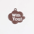 Detailed macro view of a brown cloud pendant featuring white 'With You!' text on a white background - Coffee