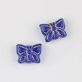 Detail of blue Czech glass butterfly beads with vintage gold gilded outlines for DIY jewelry - Transparent Blue