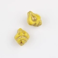 Detailed macro view of 11x13mm yellow shell-shaped glass beads with gold accents - Yellow