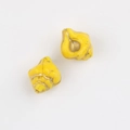 Detail of yellow conch-shaped glass beads with gold-painted edges for DIY jewelry - Lemon Yellow