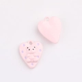 Detailed view of pink heart alloy pendant with 3D bear relief and purple polka dots - Heart Pink