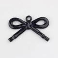 Detalle de colgante de lazo negro con purpurina para creación de joyería artesanal - Negro