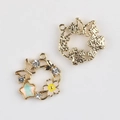 Detailed macro view showing front and matte back of floral wreath alloy pendants for jewelry - Gold Base Yellow Center