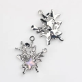 Detailed close-up of DIY silver butterfly charms with opal inlay and zircon accents - Silver Base Pink