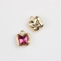 Macro detail of gold butterfly charms with pink crystal inlay and hollow-out back design - Gold Base Rose Red Rhinestone