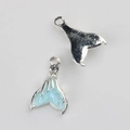 Detailed front and back view of light blue resin fish tail pendant with small rhinestone - Blue
