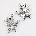 Macro detail of silver butterfly pendant with star-shaped opal and zircon inlay - Silver Base Transparent