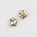 Macro view of golden butterfly charms with iridescent blue crystals for jewelry making - Gold Base Clear Zirconia