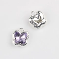Macro view of butterfly pendant with purple crystal and silver alloy hollow back - Silver Base Purple Zirconia
