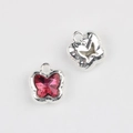 Macro detail of silver butterfly charms with pink zircon inlay for jewelry making - Silver Base Rose Red Zirconia