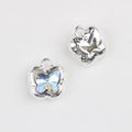 Macro detail of butterfly charms in silver metal with light blue crystal inlay and loop - Silver Base Clear Zirconia