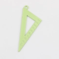 Macro shot of light green alloy triangle ruler charm with precise 1-10 scale markings - Grass Green