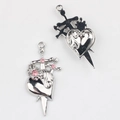 Detailed front and back views of heart and sword pendants with pink rhinestones - Silver / Pink