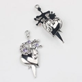 Detailed view of silver heart and sword alloy pendants with purple rhinestones for DIY jewelry - Silver Base Purple