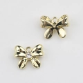 Detalle de colgantes de lazo dorado con perlas y circonitas para creación de joyería - Dorado Zircón