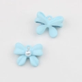 Detalle de colgantes de lazo azul claro con perla para accesorios de joyería DIY - Azul cielo