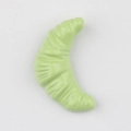 Detailed top view of a glossy light green croissant-shaped jewelry pendant accessory - Fruit Green