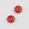 Makroaufnahme roter tschechischer Glasperlen mit goldener Schneeflocke für DIY Schmuck - Transparentes Rot