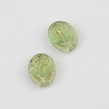 Detail showing vintage green Czech glass beads with gold embossed rose patterns - Transparent Green