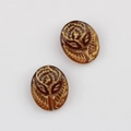 Detail of vintage Czech glass oval beads with gold rose relief for DIY jewelry making - Transparent Brown