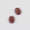 Macro view of dark purple glass clover beads with vintage gold embossing and thread hole - Transparent Dark Purple