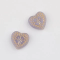 Detail of purple heart-shaped Czech beads with vintage gold floral and checkered patterns - Purple