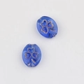 Macro detail of blue glass clover beads with gold lines for DIY jewelry making - Transparent Blue