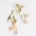 Detail of goldfish alloy pendants with pink enamel tails for DIY jewelry making - Gold Pink